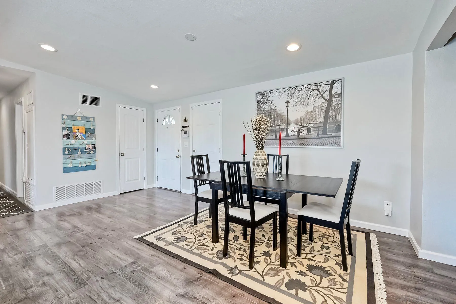 1122 Iris Avenue Imperial Beach, CA 91932 - Photo 14 of 35 a view of a dining room with furniture and wooden floor