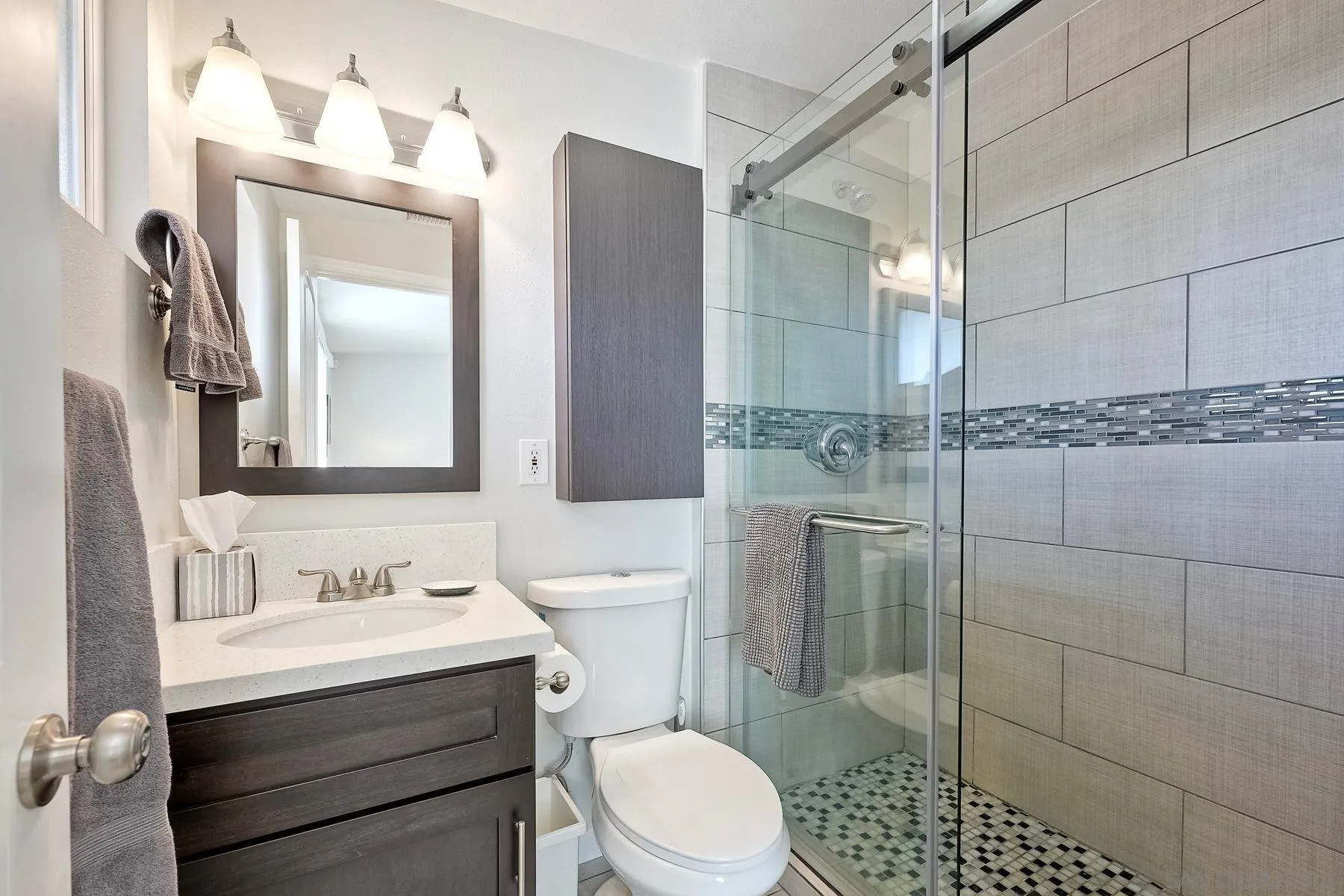 1122 Iris Avenue Imperial Beach, CA 91932 - Photo 22 of 35 a bathroom with a sink a toilet and shower