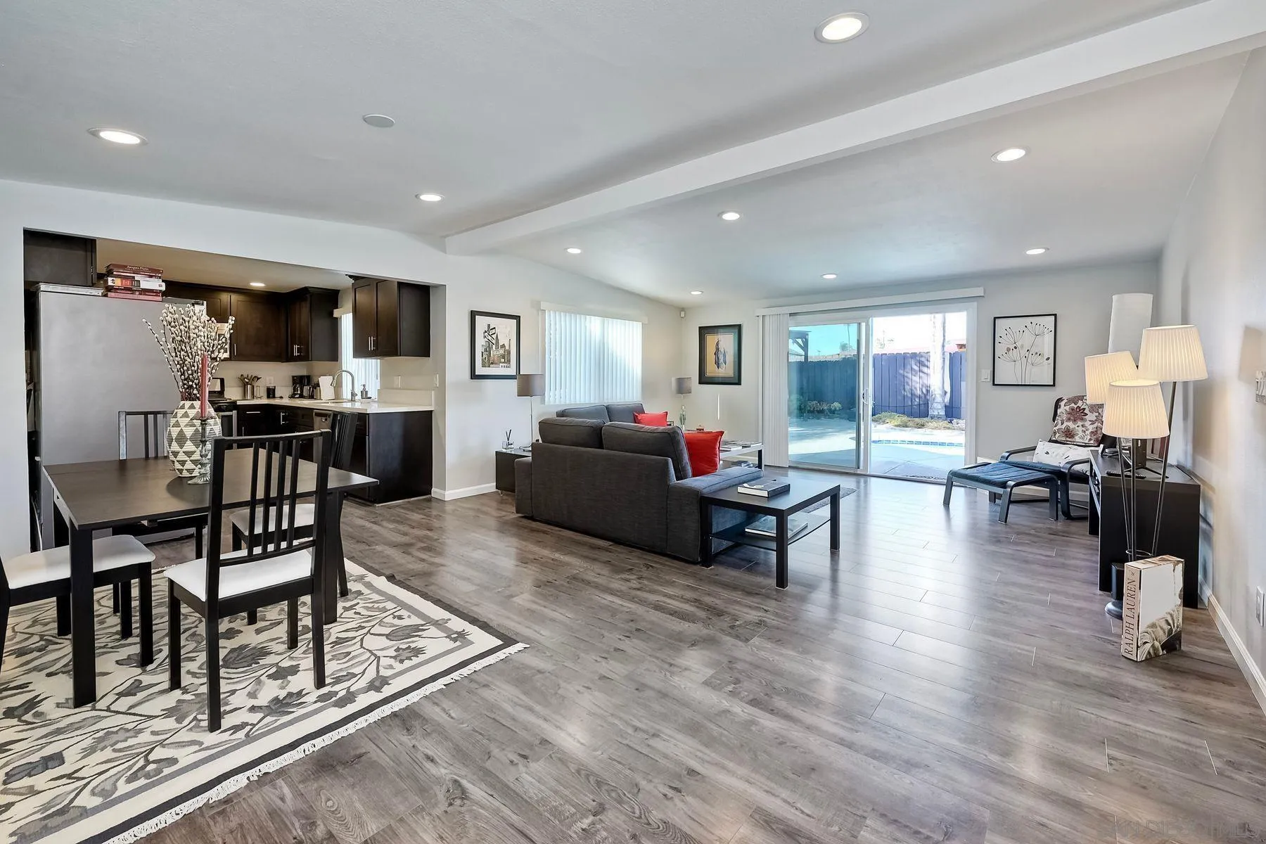 1122 Iris Avenue Imperial Beach, CA 91932 - Photo 4 of 35 a living room with furniture and a wooden floor
