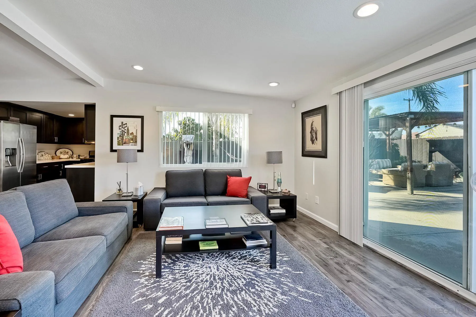 1122 Iris Avenue Imperial Beach, CA 91932 - Photo 9 of 35 a living room with furniture and a rug