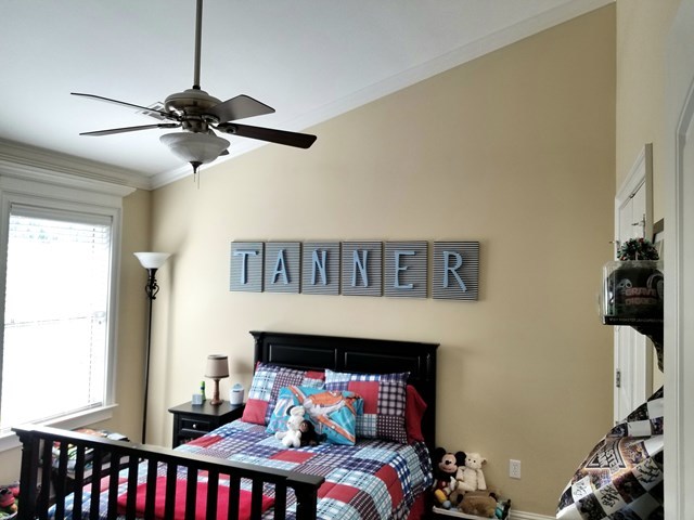 415 Wheeler Road Gray, GA 31032 - Photo 15 of 25 a bedroom with furniture and a fireplace