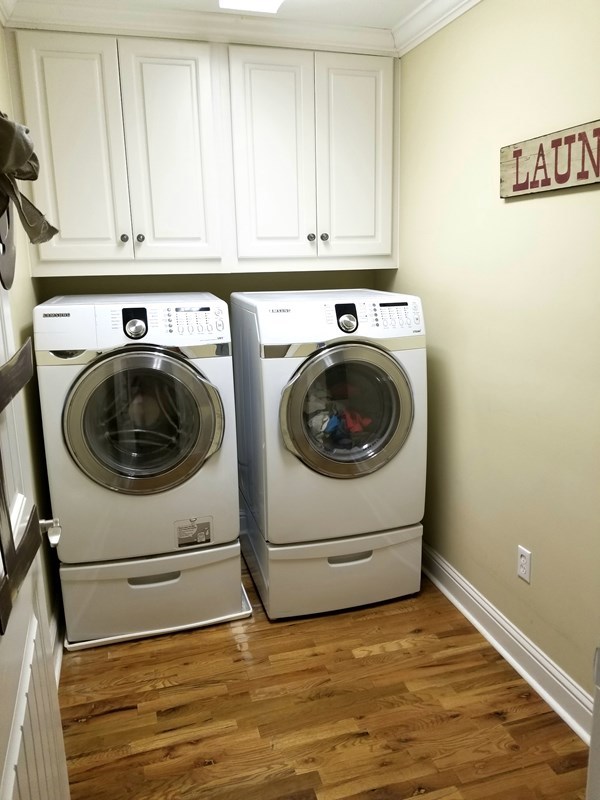 415 Wheeler Road Gray, GA 31032 - Photo 16 of 25 a utility room with dryer and washer