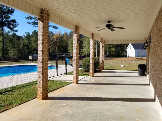 415 Wheeler Road Gray, GA 31032 - Photo 18 of 25 a view of entrance gate of the house