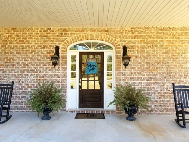 415 Wheeler Road Gray, GA 31032 - Photo 3 of 25 a front view of a building with potted plants
