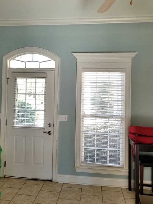 415 Wheeler Road Gray, GA 31032 - Photo 23 of 25 a view of a livingroom with a large window and an empty space