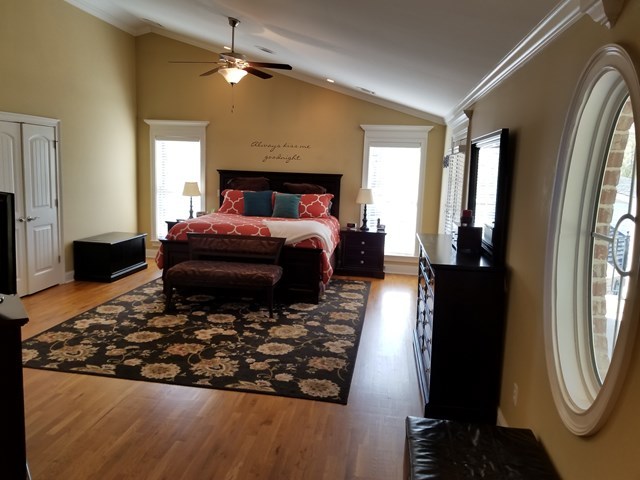 415 Wheeler Road Gray, GA 31032 - Photo 8 of 25 a bed sitting in a bedroom next to a window