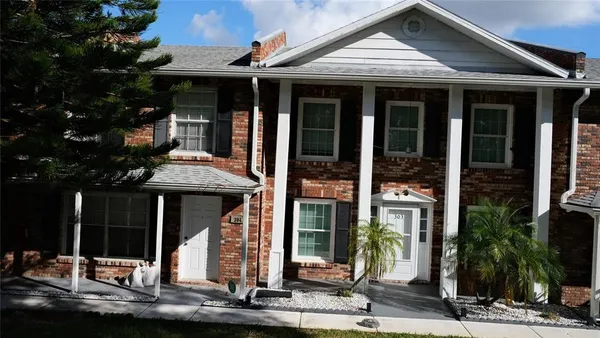 a front view of a house with street