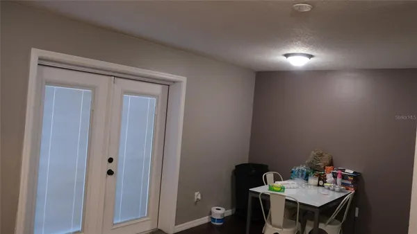 a view of a workspace with furniture