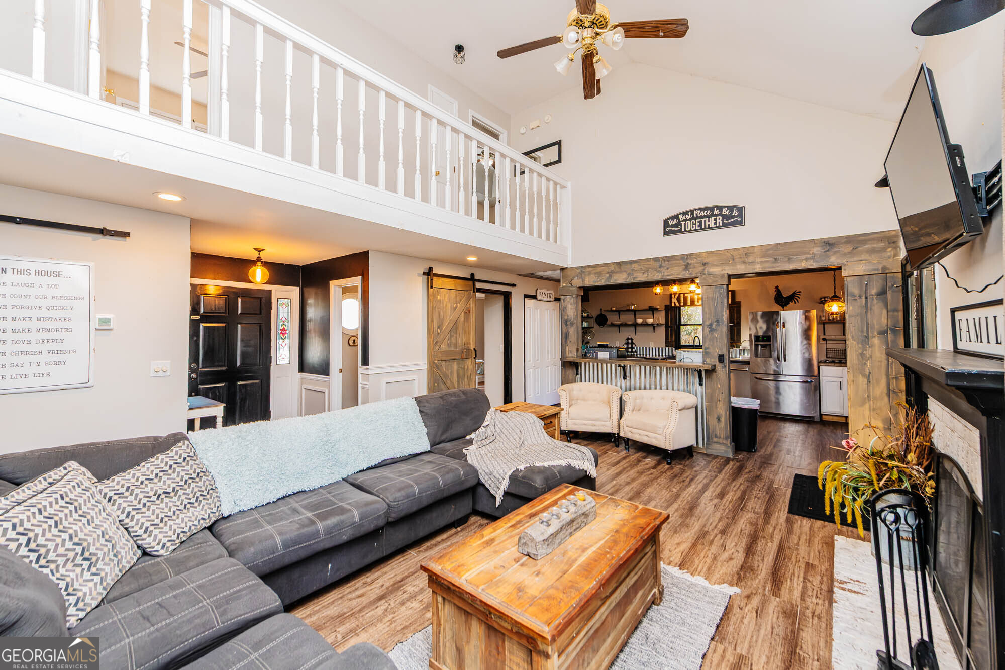 5341 Northside Drive Macon, GA 31210 - Photo 15 of 43 a living room with furniture fireplace and a large window