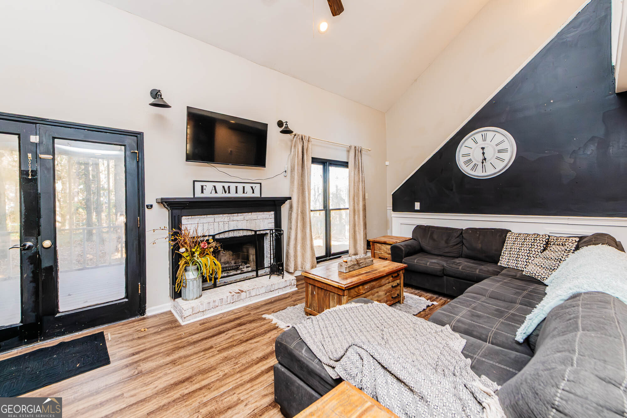 5341 Northside Drive Macon, GA 31210 - Photo 18 of 43 a living room with furniture and a fireplace