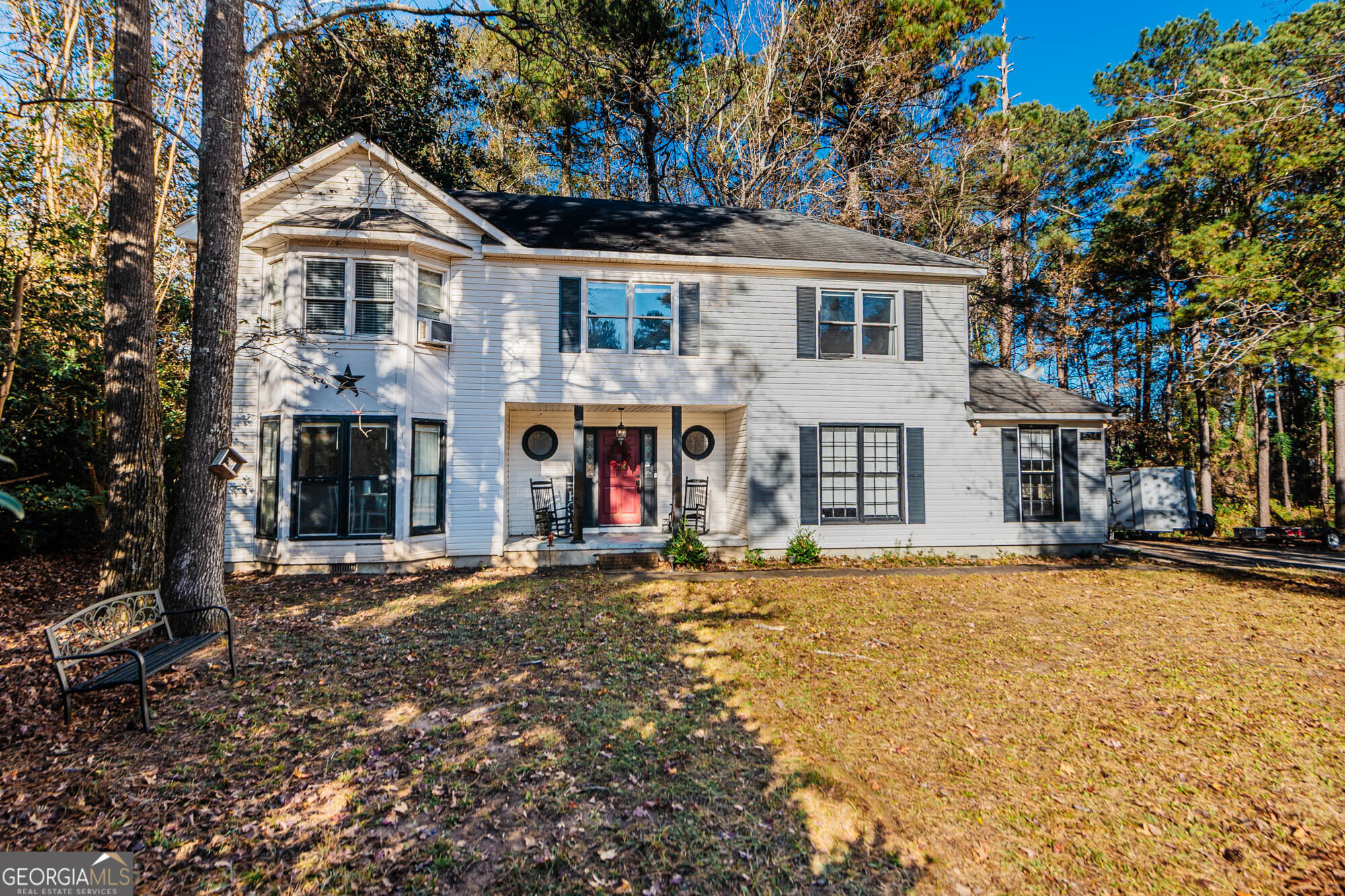 5341 Northside Drive Macon, GA 31210 - Photo 2 of 43 a front view of a house with a garden