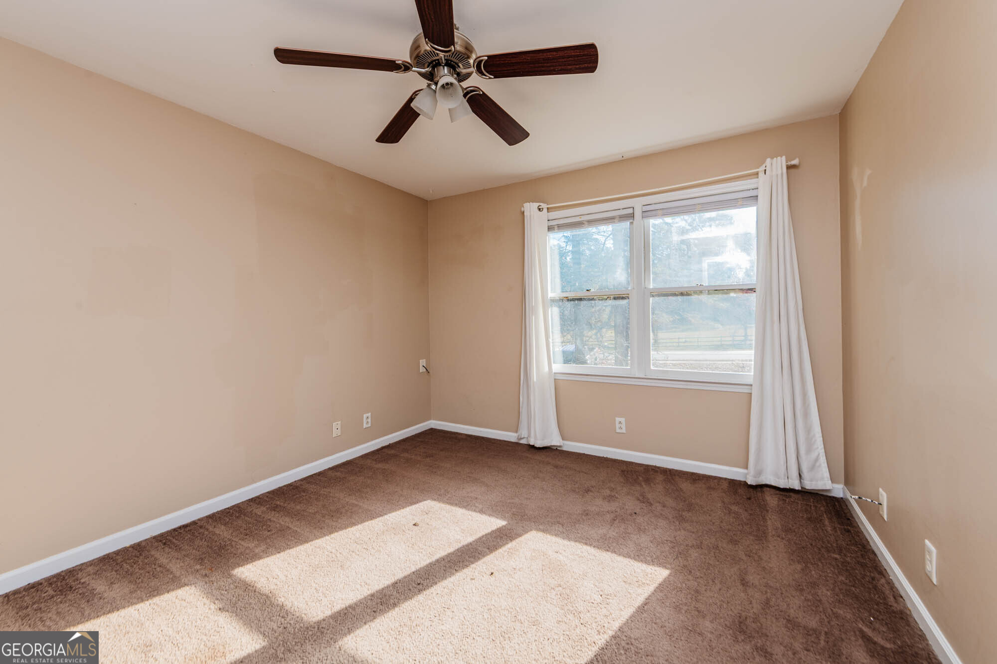 5341 Northside Drive Macon, GA 31210 - Photo 21 of 43 wooden floor in an empty room with a window
