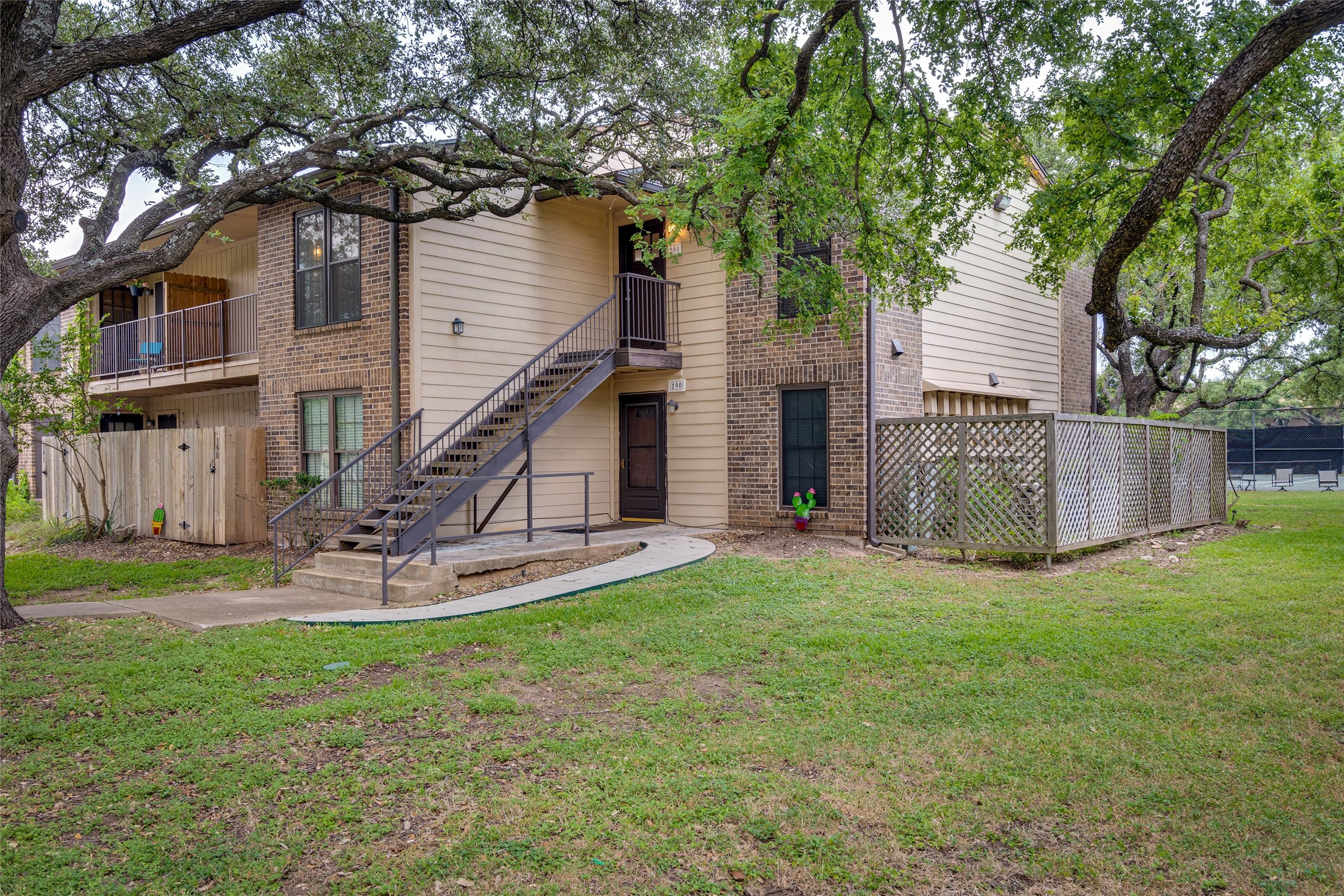 4159 Steck Avenue, Unit 290 Austin, TX 78759 - Photo 1 of 38 a view of a house with backyard and a tree