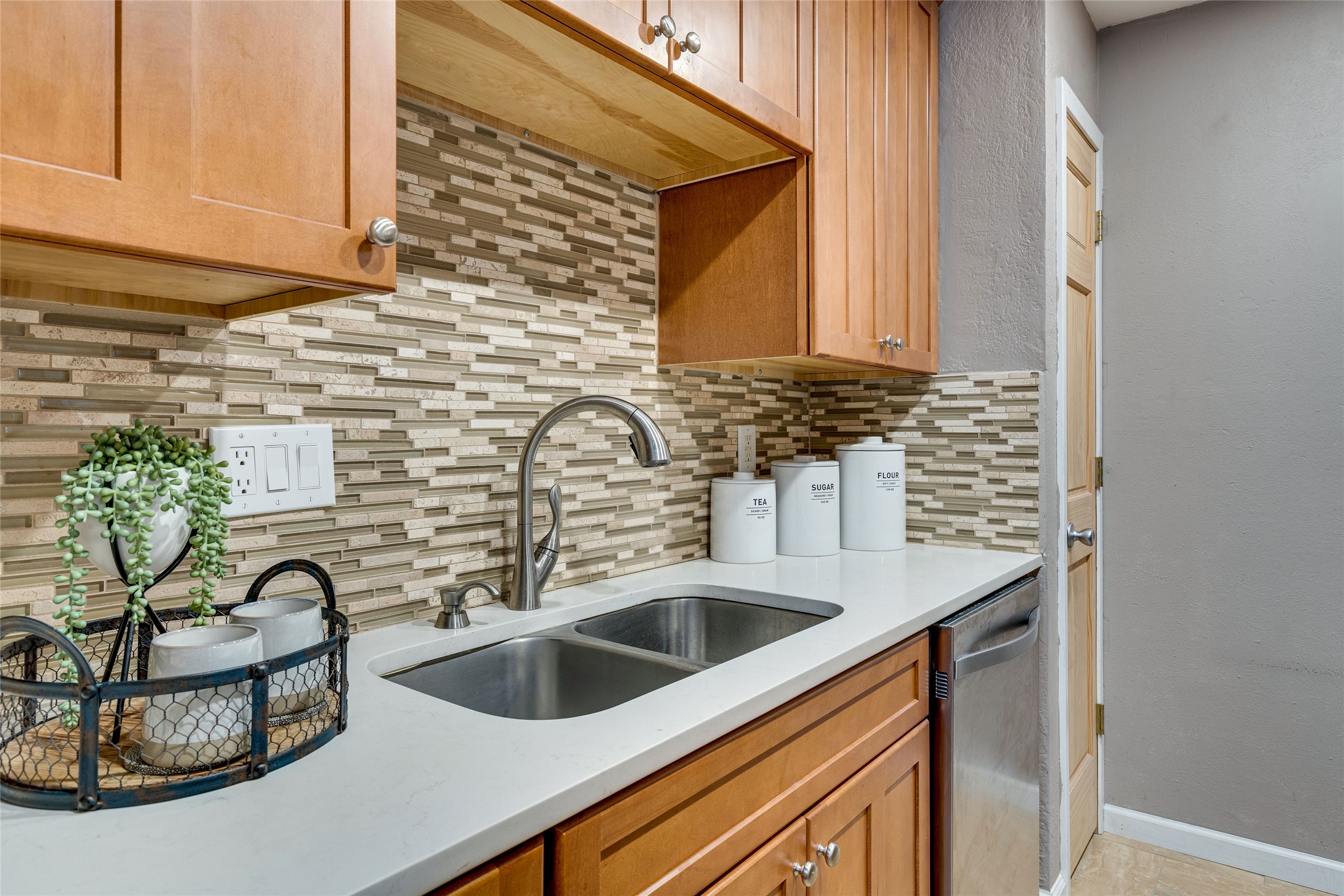 4159 Steck Avenue, Unit 290 Austin, TX 78759 - Photo 15 of 38 a kitchen with a sink and a potted plant