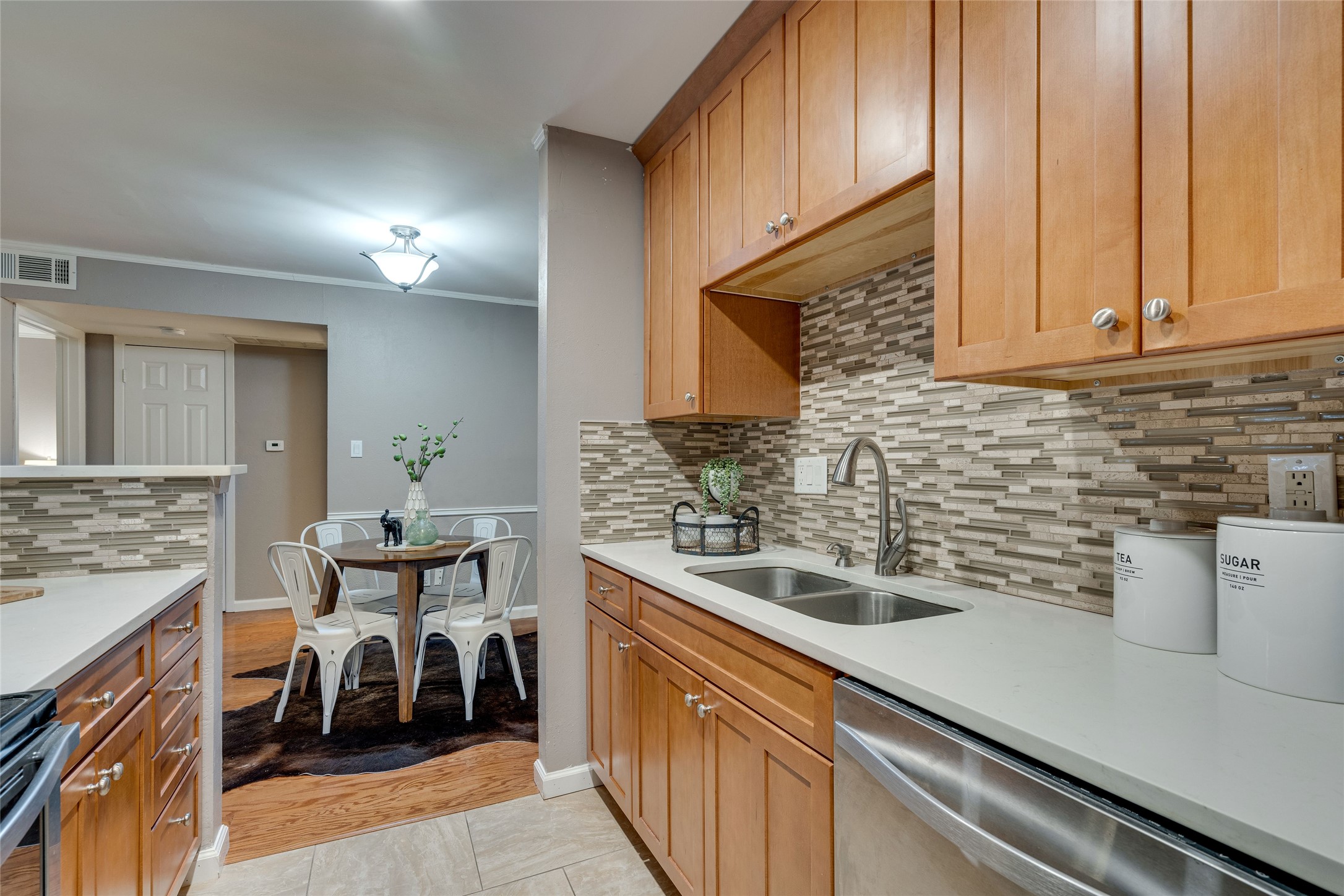 4159 Steck Avenue, Unit 290 Austin, TX 78759 - Photo 16 of 38 a kitchen with a sink and cabinets