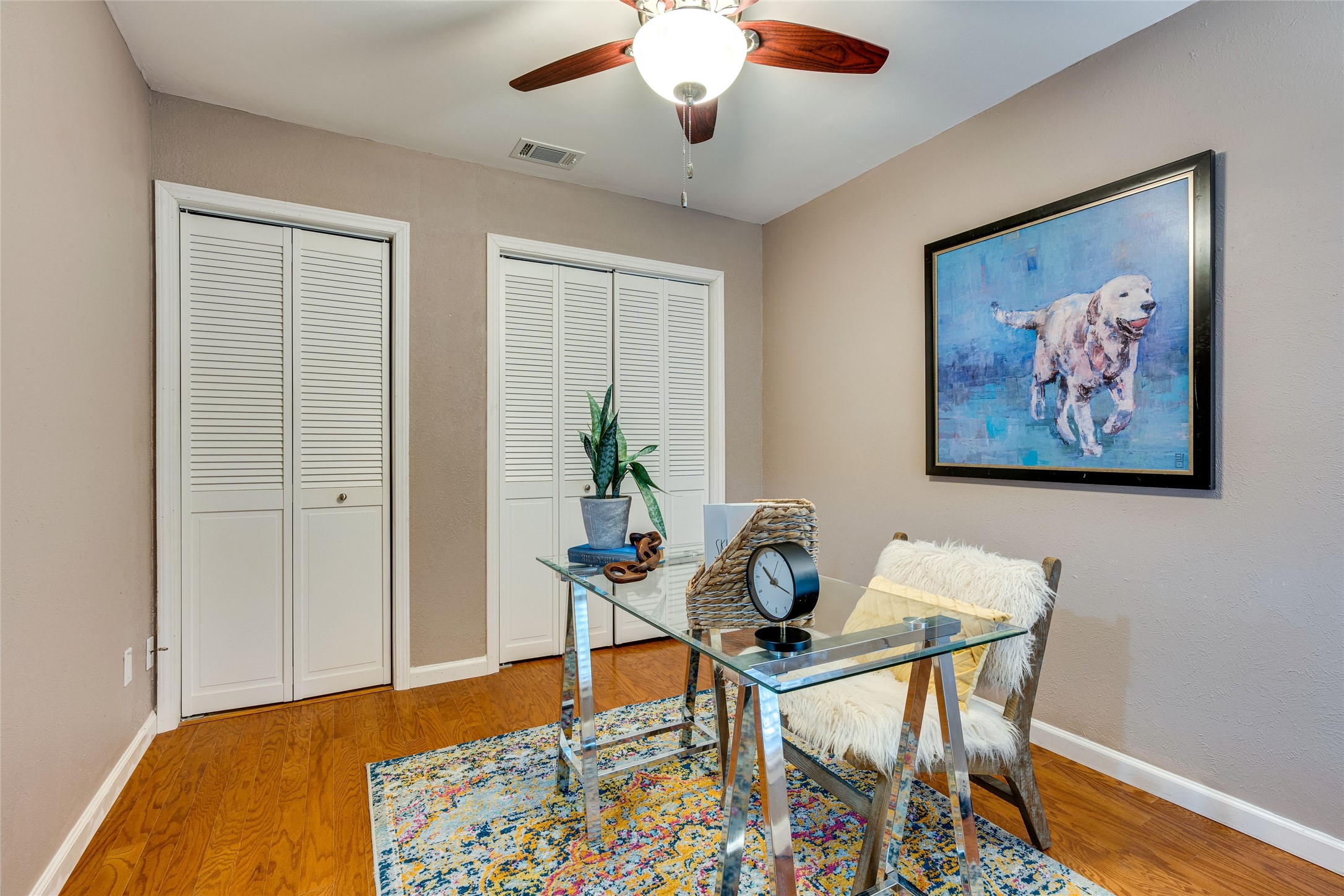 4159 Steck Avenue, Unit 290 Austin, TX 78759 - Photo 27 of 38 a dining room with furniture and wooden floor