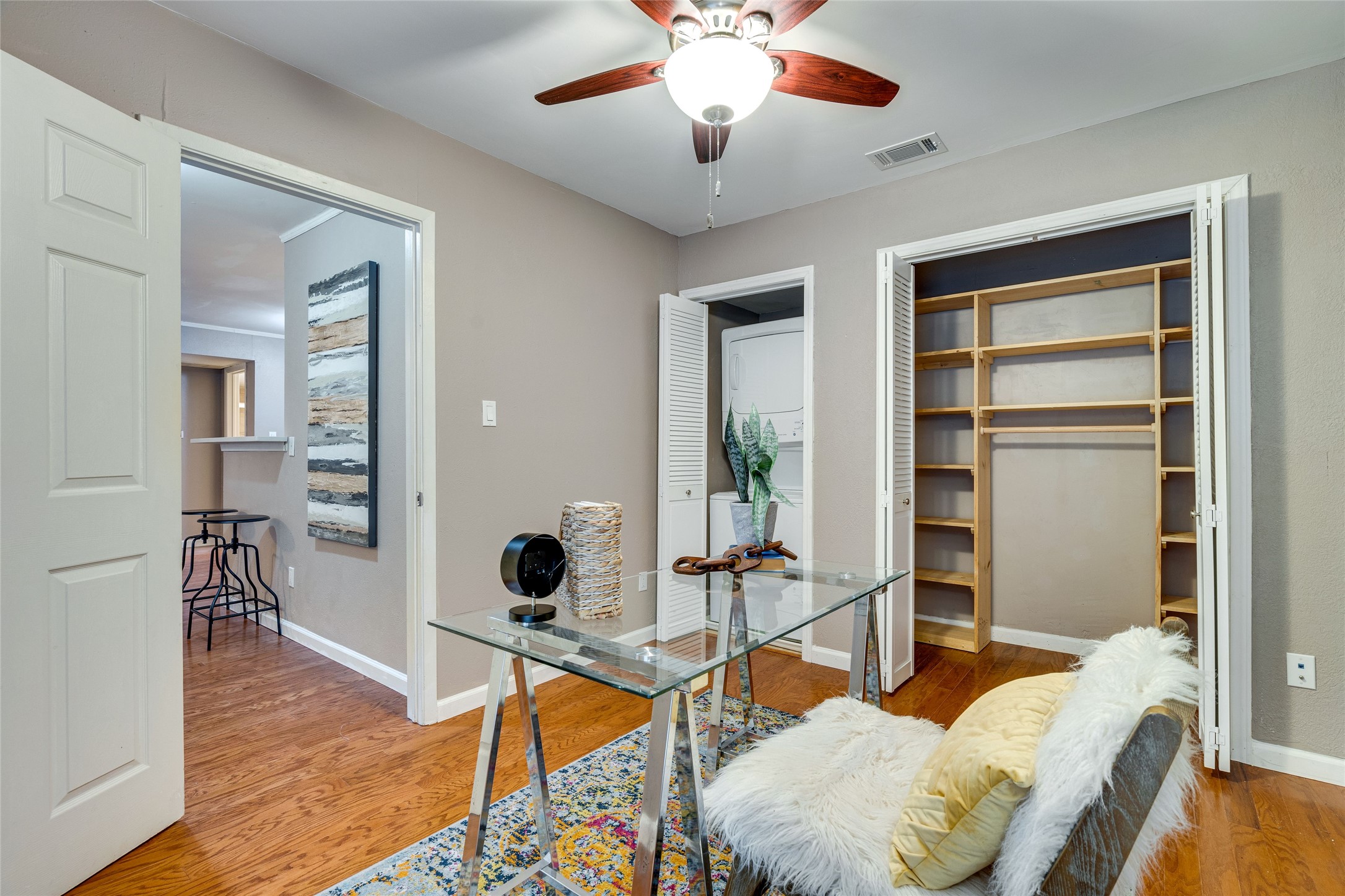 4159 Steck Avenue, Unit 290 Austin, TX 78759 - Photo 28 of 38 a living room with furniture and wooden floor