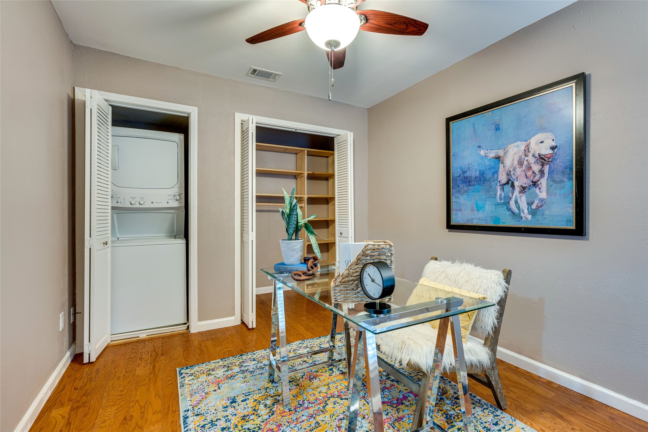 4159 Steck Avenue, Unit 290 Austin, TX 78759 - Photo 29 of 38 a dining room with furniture and wooden floor