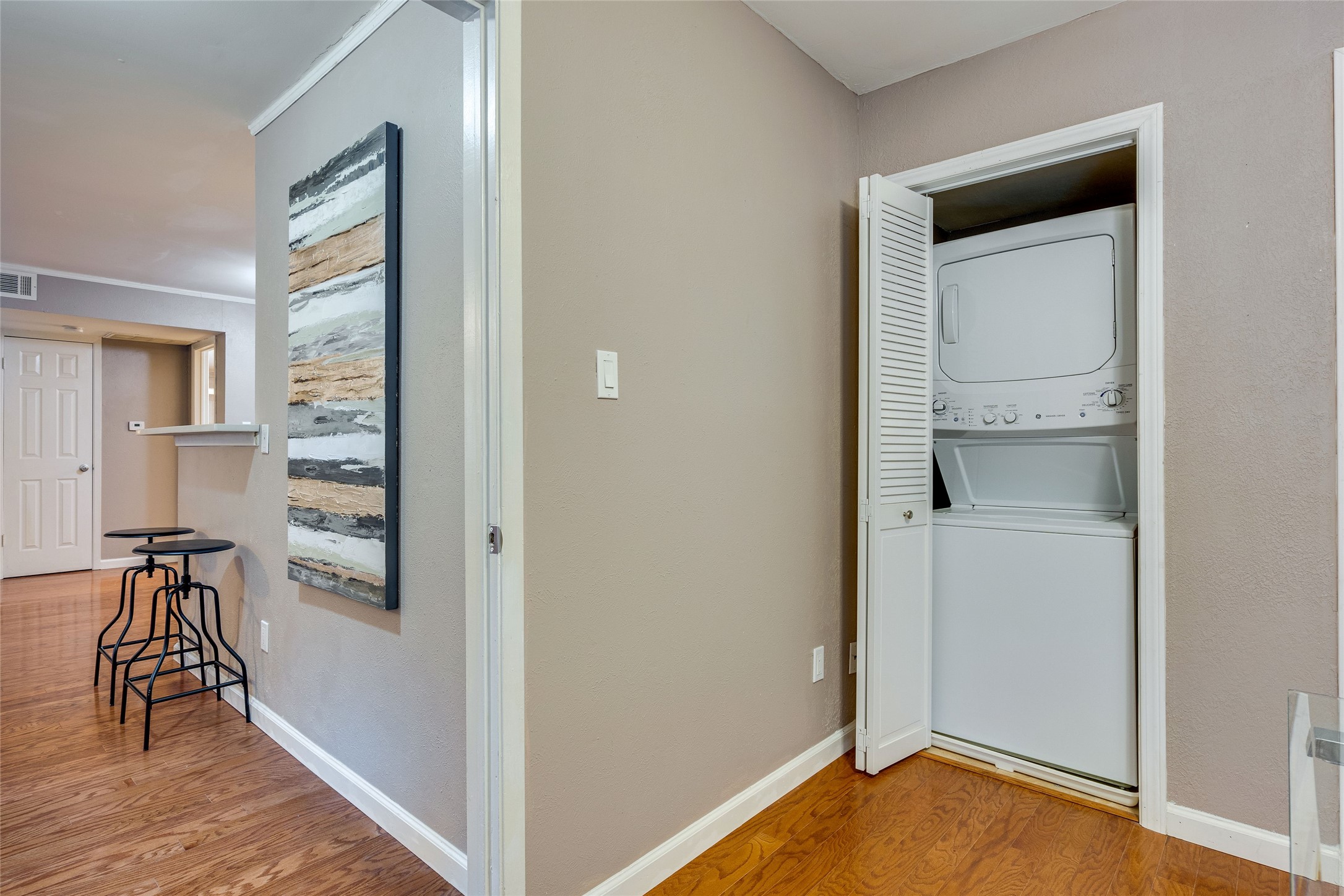 4159 Steck Avenue, Unit 290 Austin, TX 78759 - Photo 32 of 38 a view of hallway with wooden floor