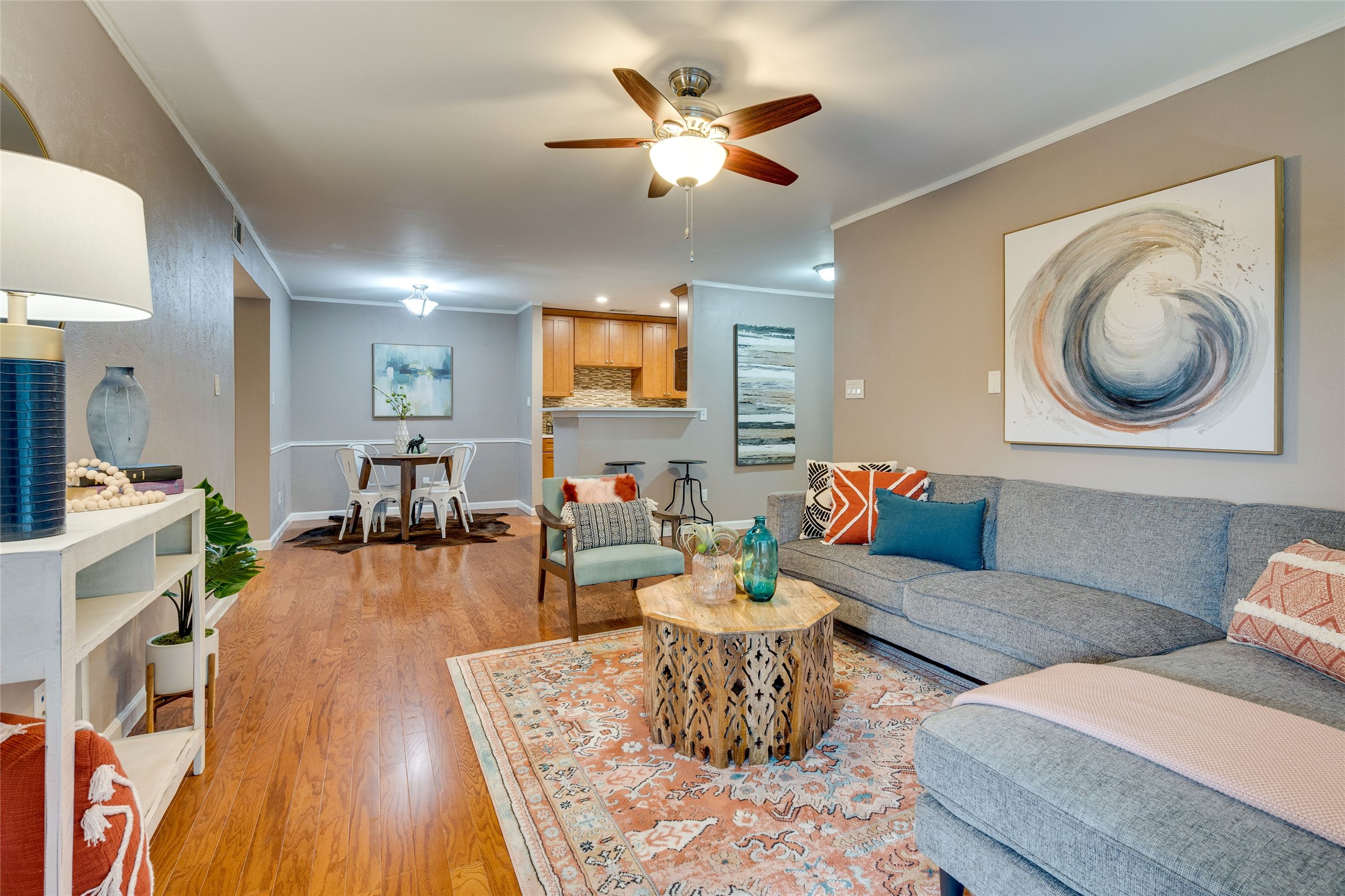 4159 Steck Avenue, Unit 290 Austin, TX 78759 - Photo 7 of 38 a living room with furniture and a wooden floor