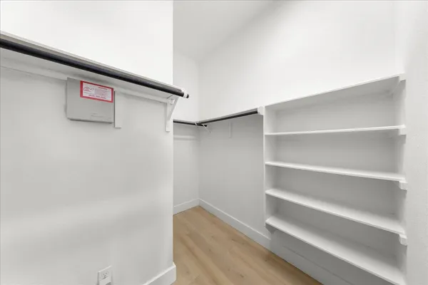 a view of small space with racks on the wall