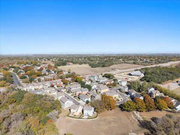 an aerial view of a city with lots of residential buildings