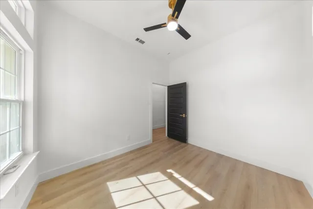 a view of an empty room and window