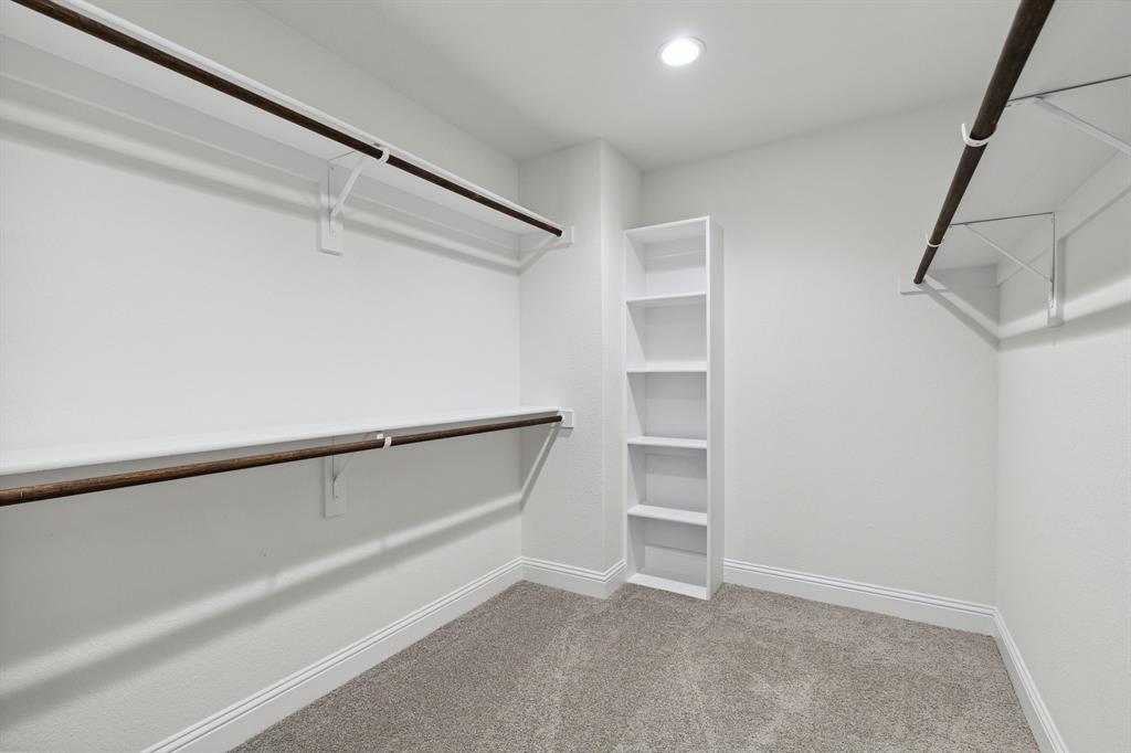 6028 Bursey Road Watauga, TX 76148 - Photo 22 of 27 a view of an empty walk in closet