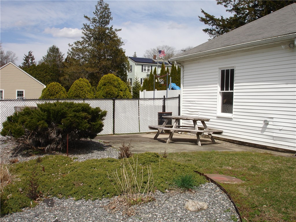 705 Mendon Road Woonsocket, RI 02895 - Photo 24 of 26 Picnic area behind garage overlooking pool
