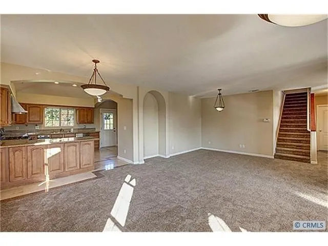 a view of a kitchen with a sink