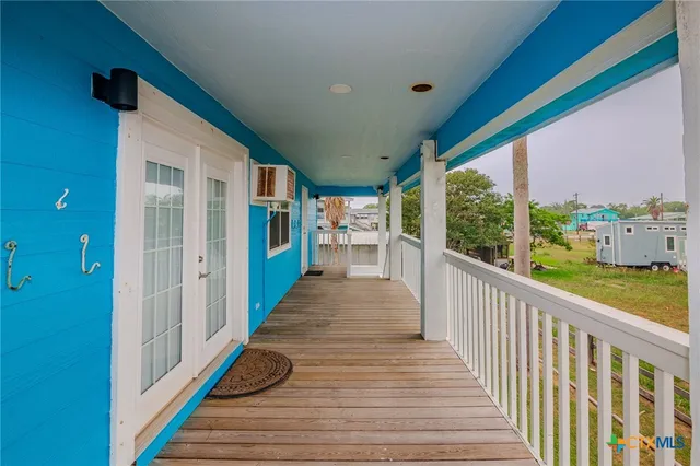 a view of a house with a yard and garage