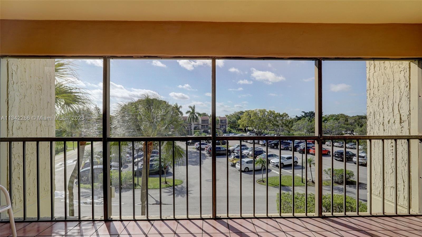 Racquet Club Apartments at Bonaventure Weston, FL 33326 - Photo 16 of 26 a view of a city from a balcony