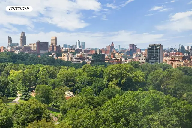 a view of a city with tall buildings in the background