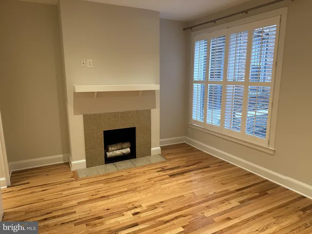 a view of a livingroom with a fireplace