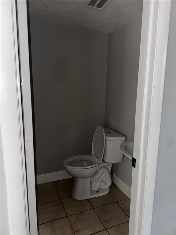 4701 Flat Shoals Road, Unit 59B Union City, GA 30291 - Photo 4 of 13 a toilet sitting in a bathroom next to a sink