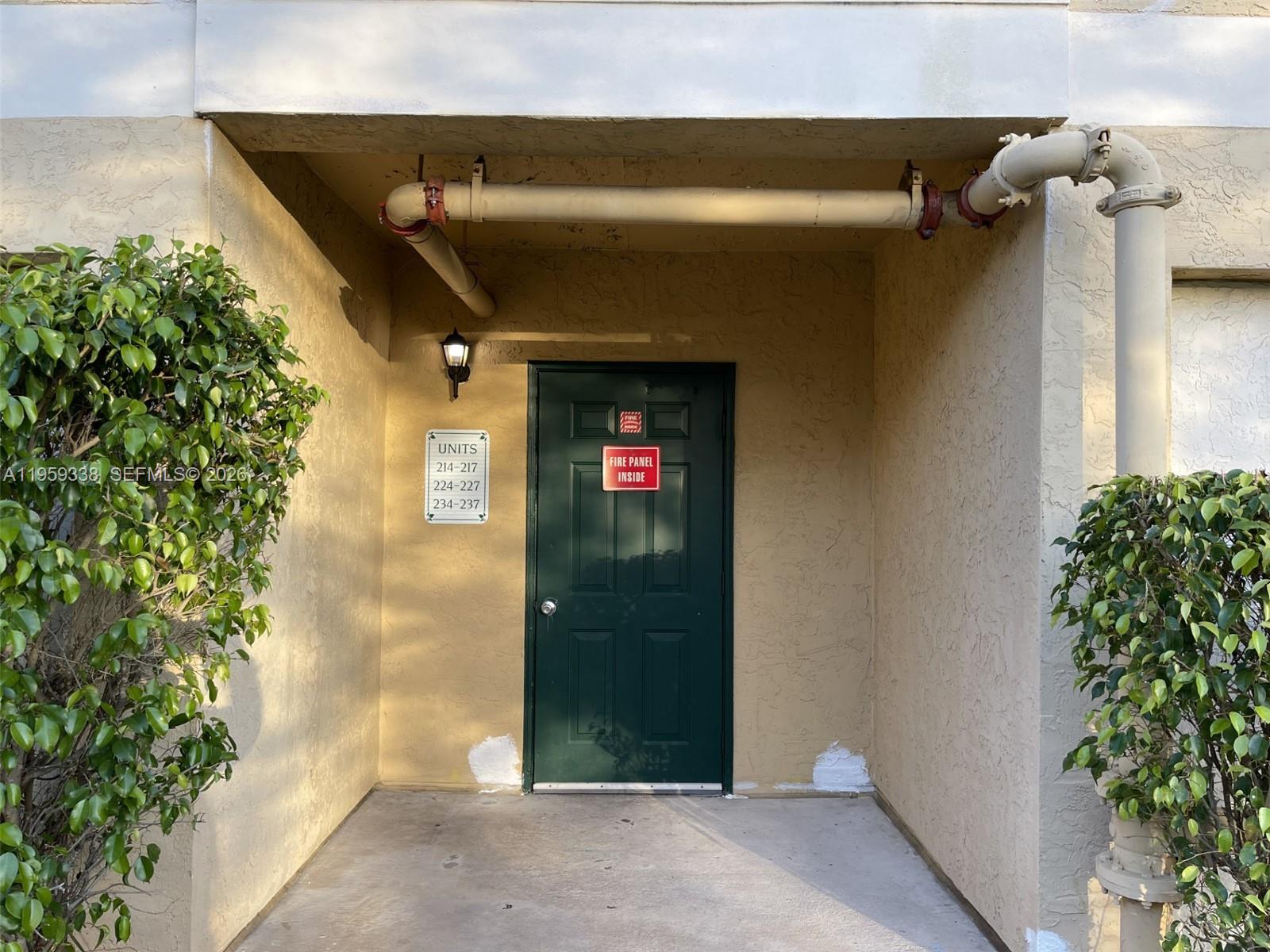 977 Riverside Drive, Unit 227 Coral Springs, FL 33071 - Photo 33 of 36 a view of a door of the house