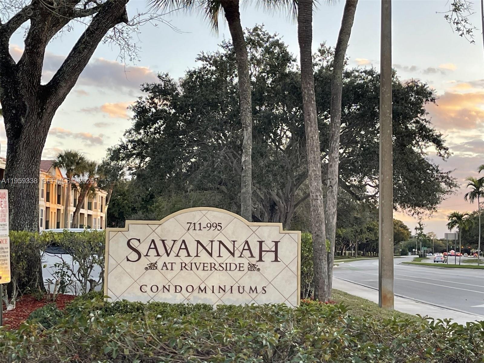 977 Riverside Drive, Unit 227 Coral Springs, FL 33071 - Photo 36 of 36 a sign on the side of a building