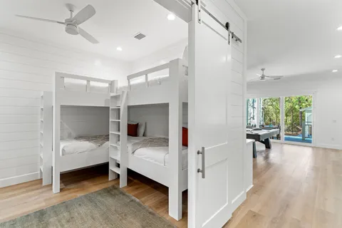 a bedroom with a bed and a table