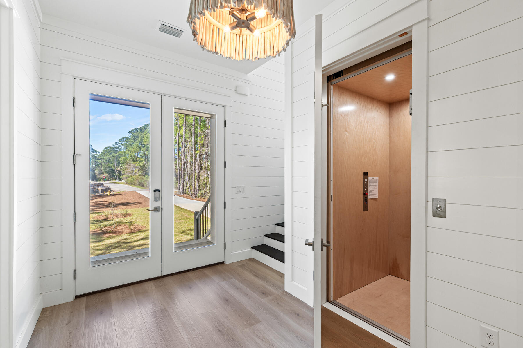 74 Shady Pines Drive Santa Rosa Beach, FL 32459 - Photo 16 of 51 a view of a bathroom with a glass door