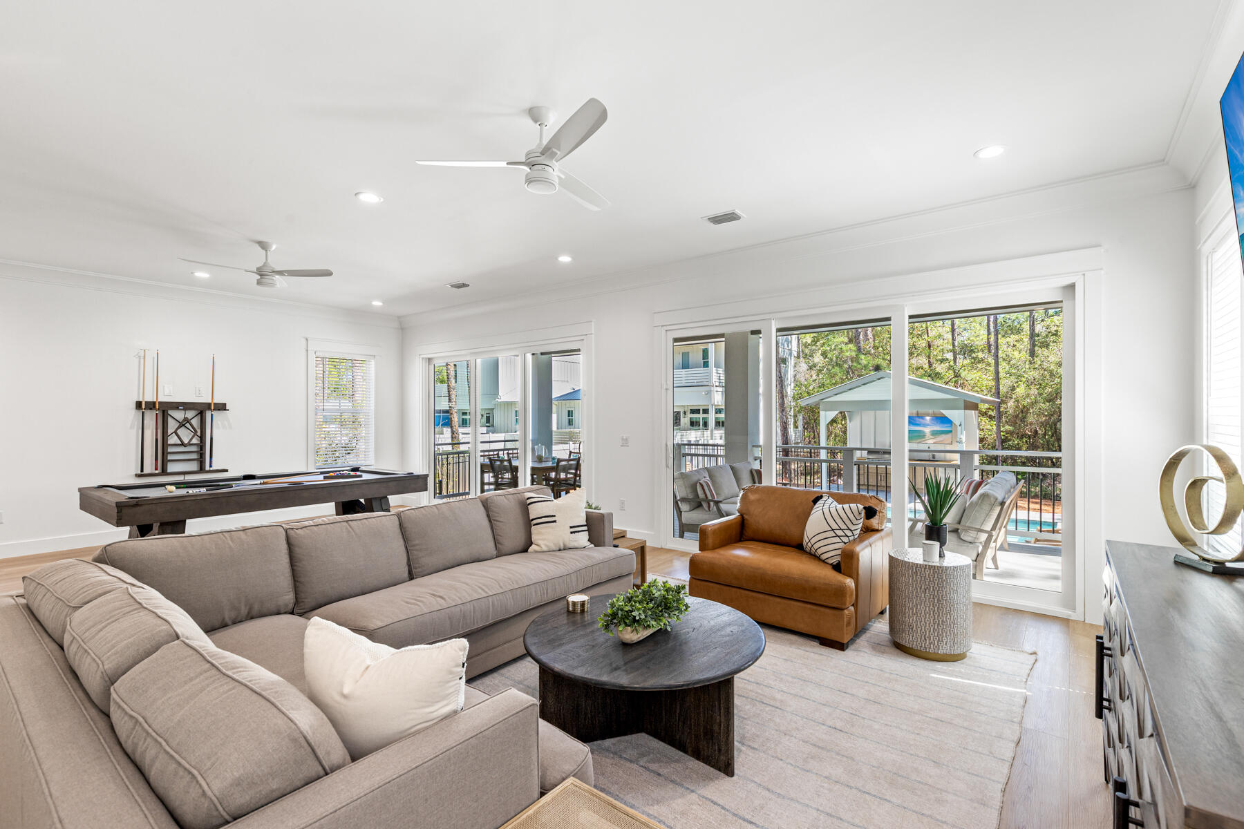 74 Shady Pines Drive Santa Rosa Beach, FL 32459 - Photo 20 of 51 a living room with furniture a table and a potted plant