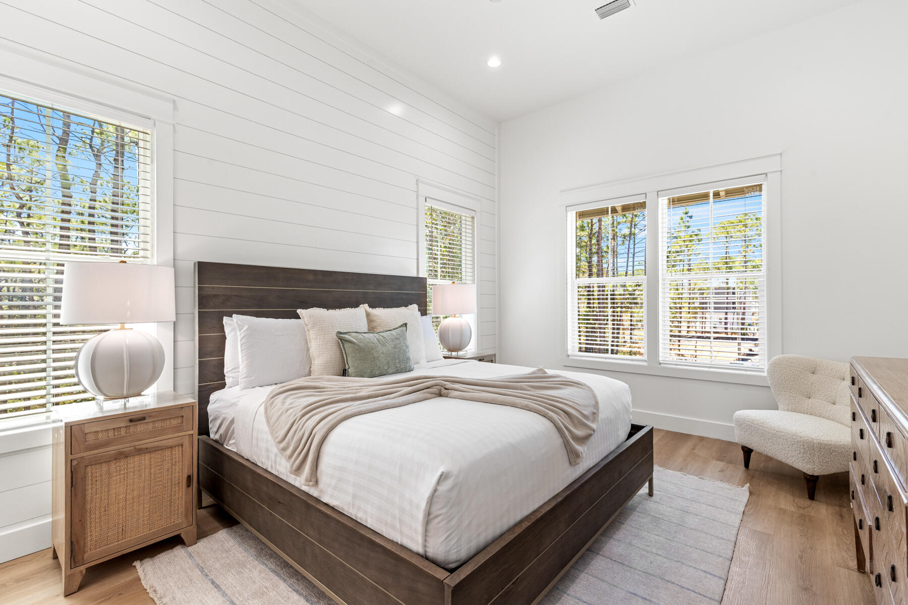 74 Shady Pines Drive Santa Rosa Beach, FL 32459 - Photo 28 of 51 a bedroom with a bed and wooden floor