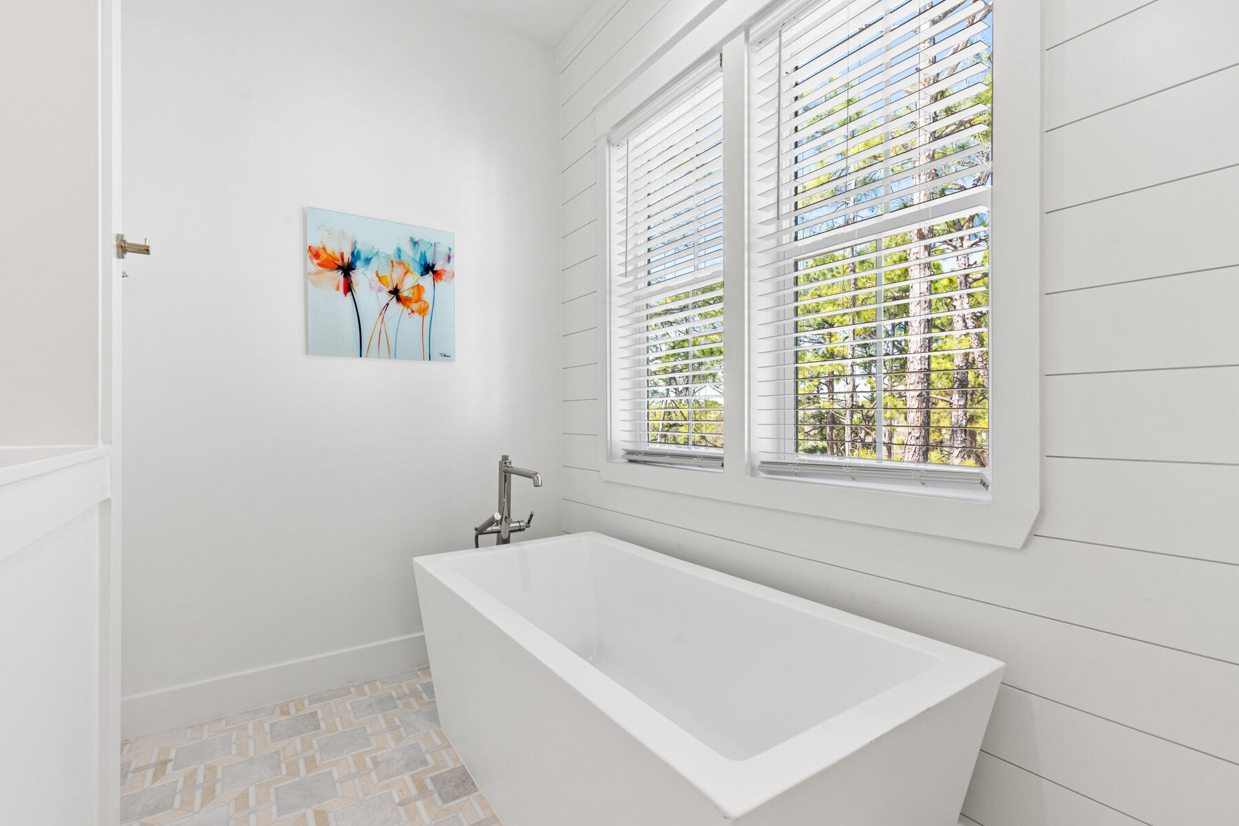 74 Shady Pines Drive Santa Rosa Beach, FL 32459 - Photo 36 of 51 a white bath tub sitting in a bathroom next to a window