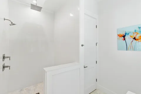 a bed room with a bed and a dresser