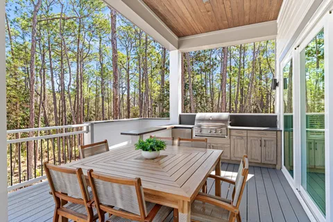 a kitchen with a cabinets and white appliances