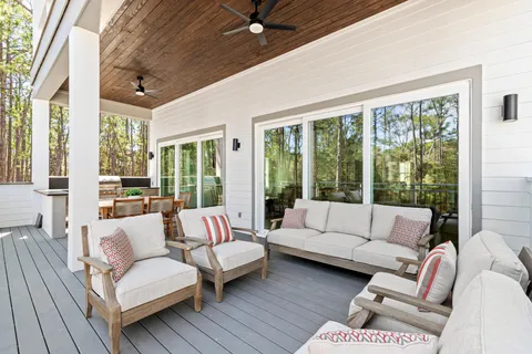 a kitchen with appliances a sink and cabinets