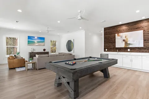 a room with furniture and a flat screen tv