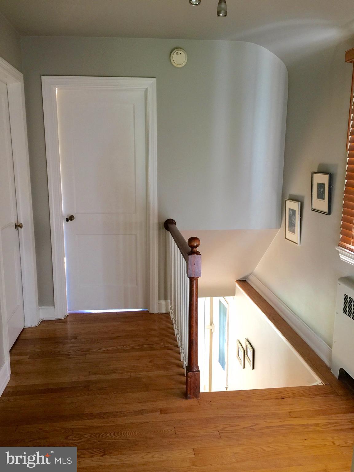 2444 Pickwick Road Baltimore, MD 21207 - Photo 19 of 24 a view of a room with wooden floor