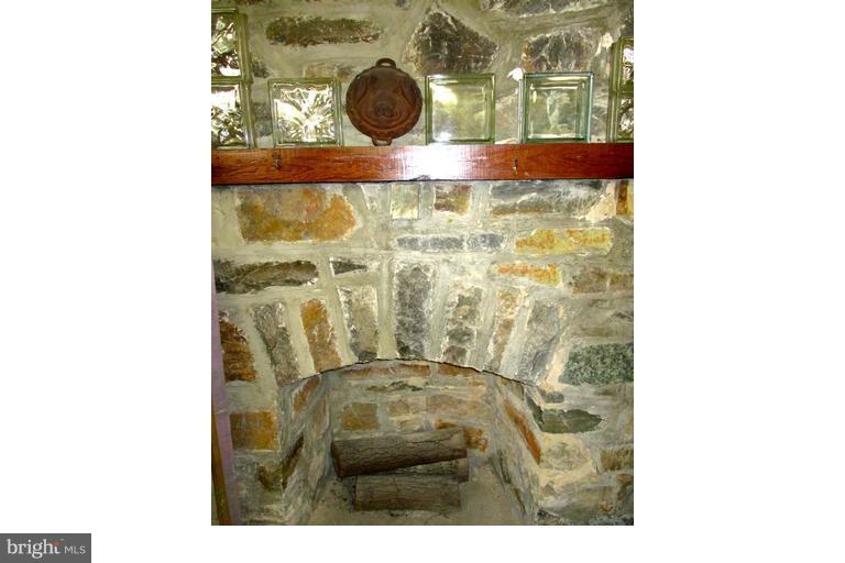2444 Pickwick Road Baltimore, MD 21207 - Photo 20 of 24 a bathroom with a toilet and a shower