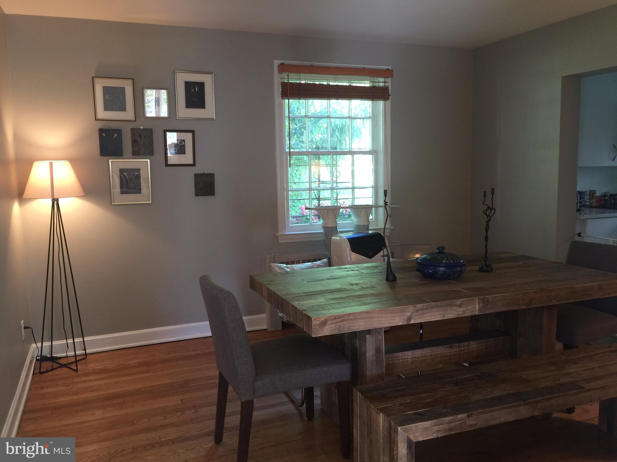2444 Pickwick Road Baltimore, MD 21207 - Photo 4 of 24 a view of a workspace with furniture