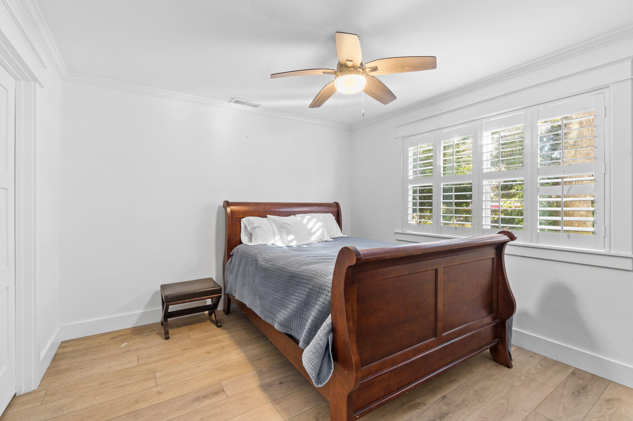 517 Main Street Destin, FL 32541 - Photo 8 of 14 a bedroom with a bed and a window